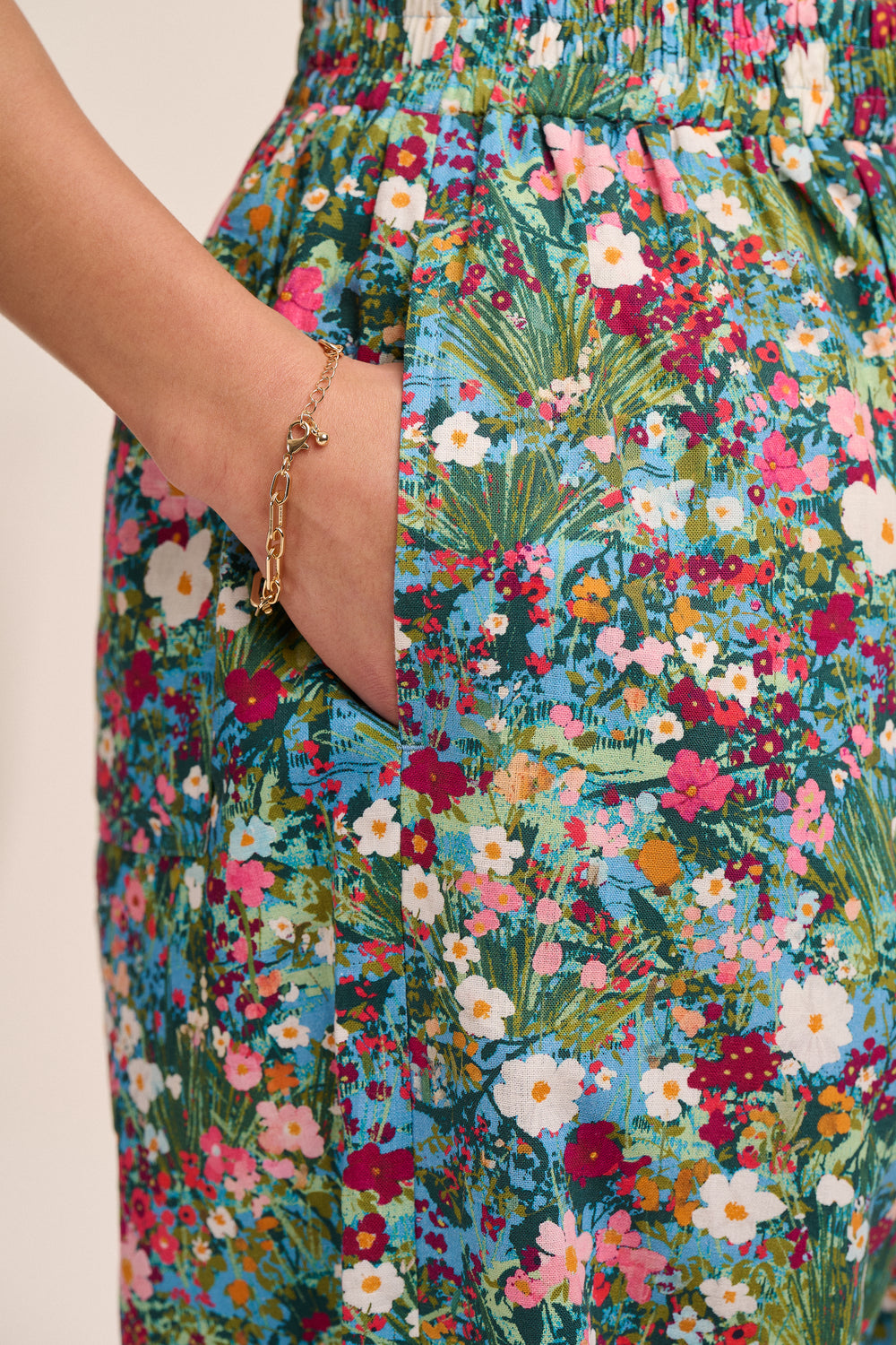 Peggy Linen Trousers - Spring Floral – back view / styled detail