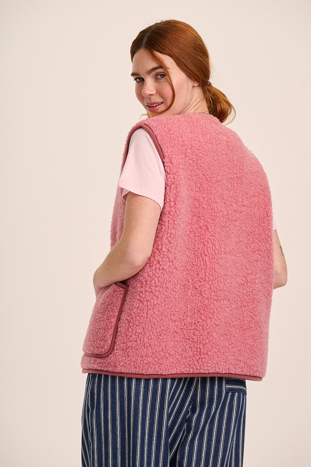 Coldbreaker Peptico Vest - Pink – back view / styled detail
