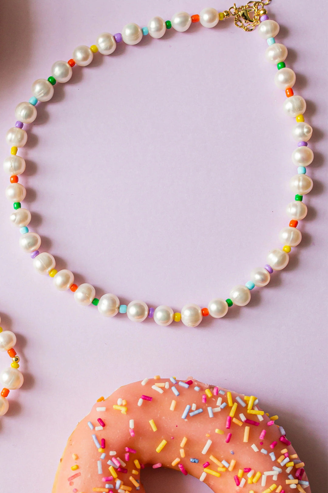 Freshwater pearl choker necklace with multicoloured rainbow glass seed beads