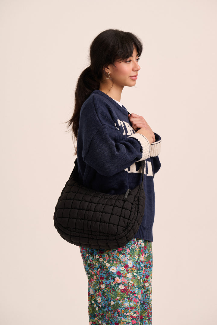 Dumpling Quilted Crossbody Bag - Black – back view / styled detail