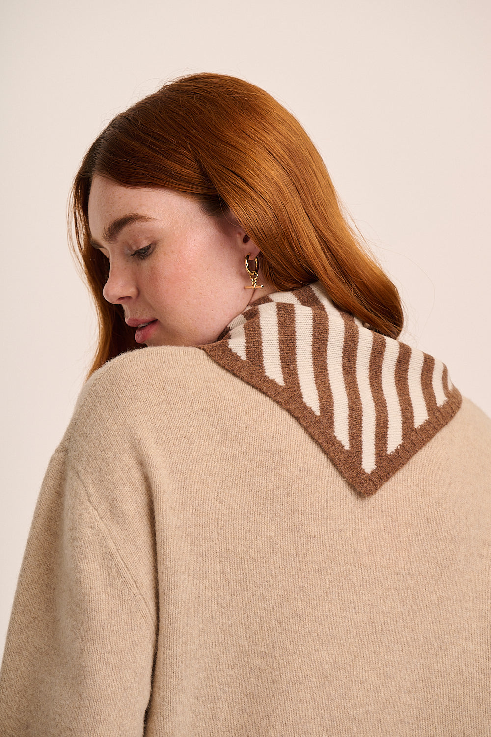 Nova Merino Wool Knitted Triangle Scarf - Brown Stripe – back view / styled detail