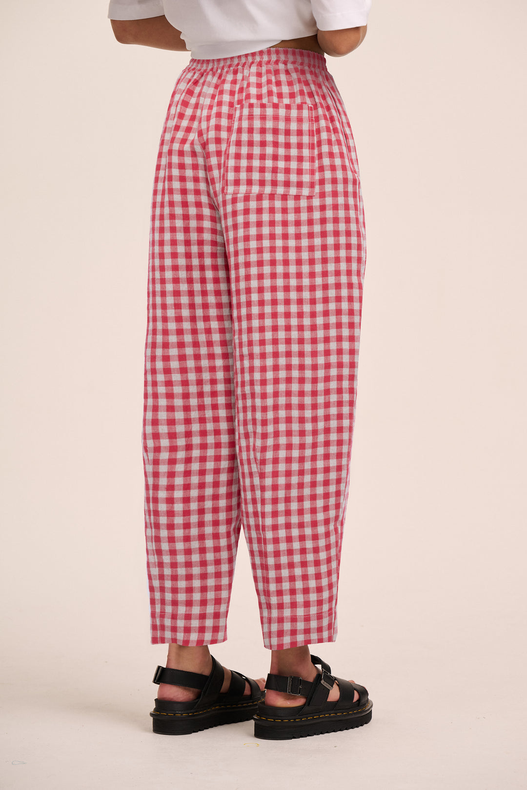 Peggy Linen Trousers - Red & Sand Gingham – back view / styled detail