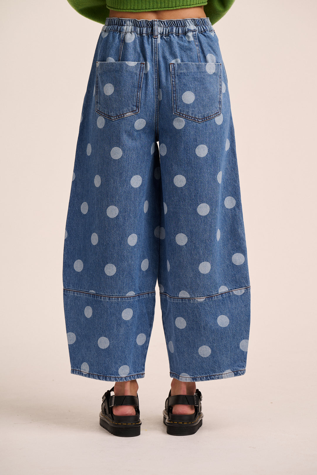 Back view of polka dot barrel jeans showing elasticated waistband and patch pockets