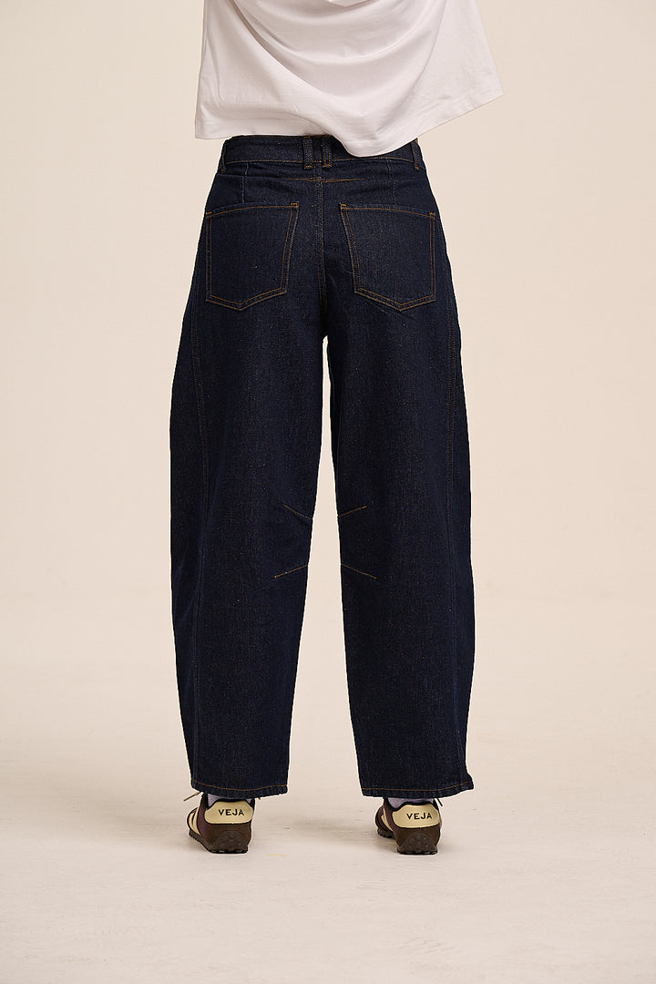 Ginny curved leg jeans front view showing knee darts and 5-pocket detail