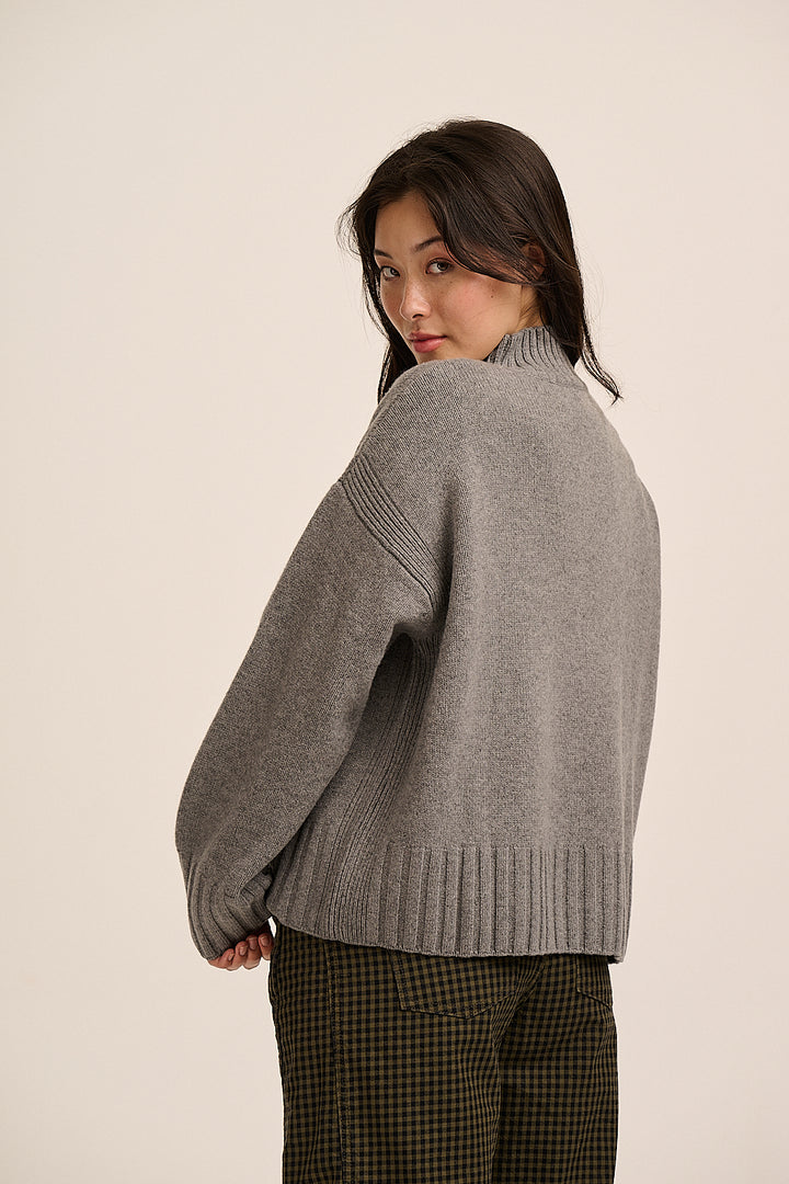 Lottie merino jumper side view showing dropped shoulder and ribbed hem