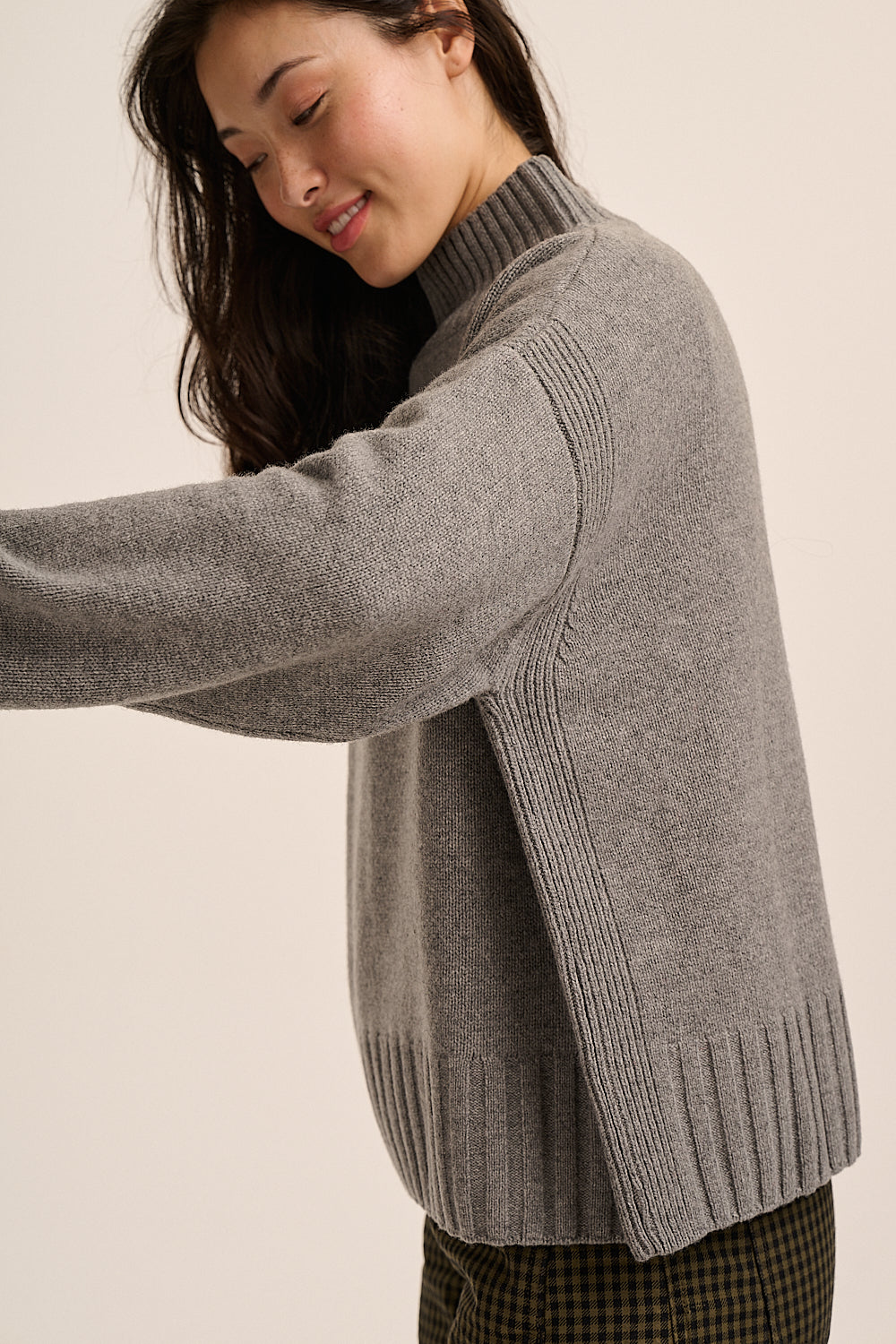 RWS merino funnel-neck jumper styled with checked trousers — Mutha.Hood