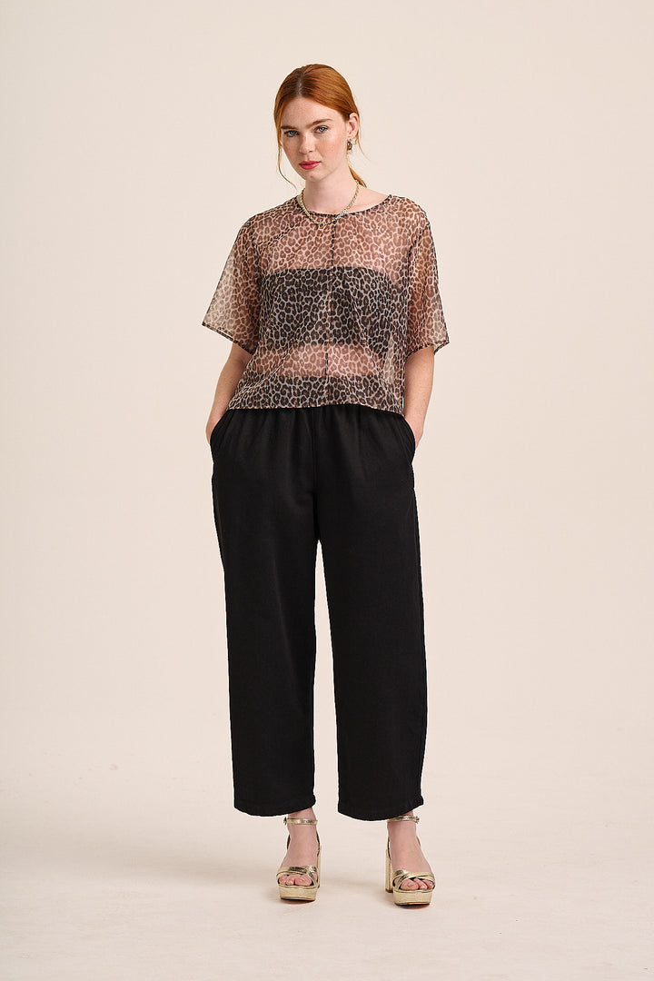 Sheer leopard blouse styled with black Ottie trousers — Mutha.Hood